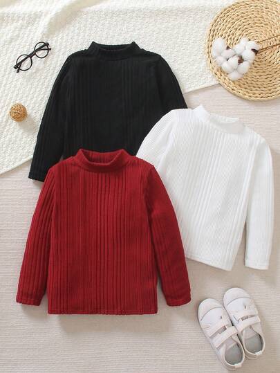 3 piezas Camisetas de manga larga con cuello de tortuga acanaladas para niños pequeños, a rayas verticales en negro, blanco y rojo con textura de punto, etiqueta de tela negra y marca blanca en el pecho izquierdo, adecuadas para uso casual, actividades al aire libre, reuniones familiares, primavera/otoño o como capa en invierno