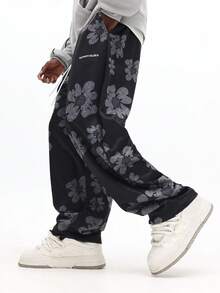 SUMWON Pantalones de chándal con estampado floral de pierna recta y cordón, con gran patrón de flor gris de Summon Studios - Multicolor - Ver 3