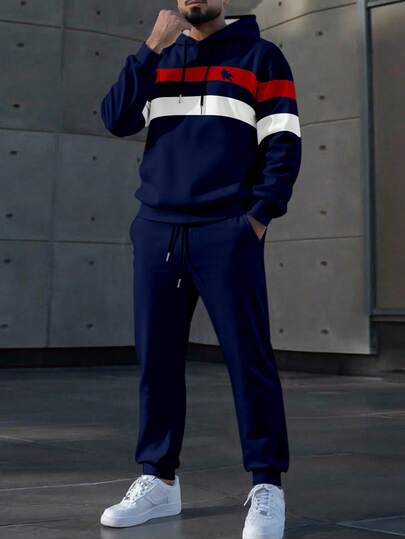 Manfinity Homme طقم هوديي وبنطلون رياضي مع خطوط متباينة للرجال