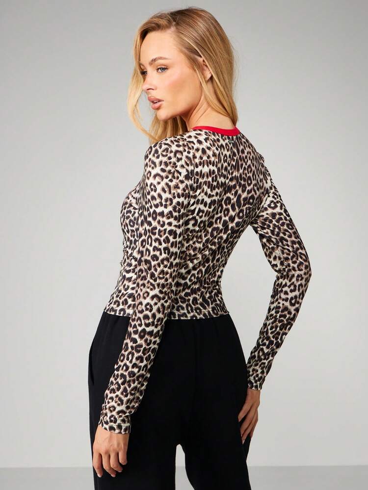 Missguided x Playboy Long Sleeve Leopard Print Top With Red Logo And Contrast Trim Details