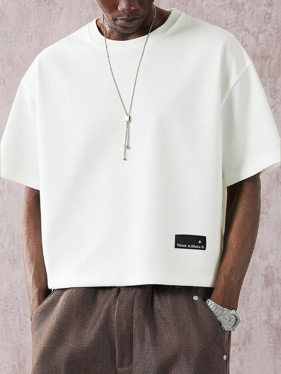 STYNVO Áo thun nam cổ tròn rộng rãi họa tiết chữ - trắng - Xem 1