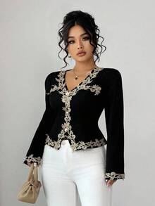 Elenzga Áo sơ mi nữ cổ chữ V tay dài màu tương phản, trang trí nhún bèo hàng ngày theo phong cách Âu Mỹ thanh lịch, tinh tế, thích hợp cho Halloween, lễ hội âm nhạc, đi chơi, hẹn hò, mua sắm, giải trí và các dịp khác - màu đen - Xem 1