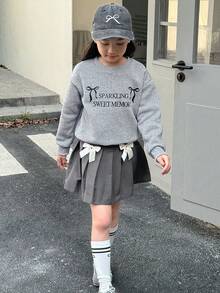 Genkimix Kids 青少年女孩字母和蝴蝶结印花圆领长袖运动衫和蝴蝶结装饰百褶迷你裙休闲装