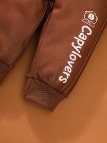 SHEIN Conjunto de ropa de invierno para bebé niño con sudadera de manga raglán de color marrón, sudadera de manga larga con orejas 3D, ropa de bebé