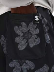 SUMWON Pantalones de chándal con estampado floral de pierna recta y cordón, con gran patrón de flor gris de Summon Studios - Multicolor - Ver 6