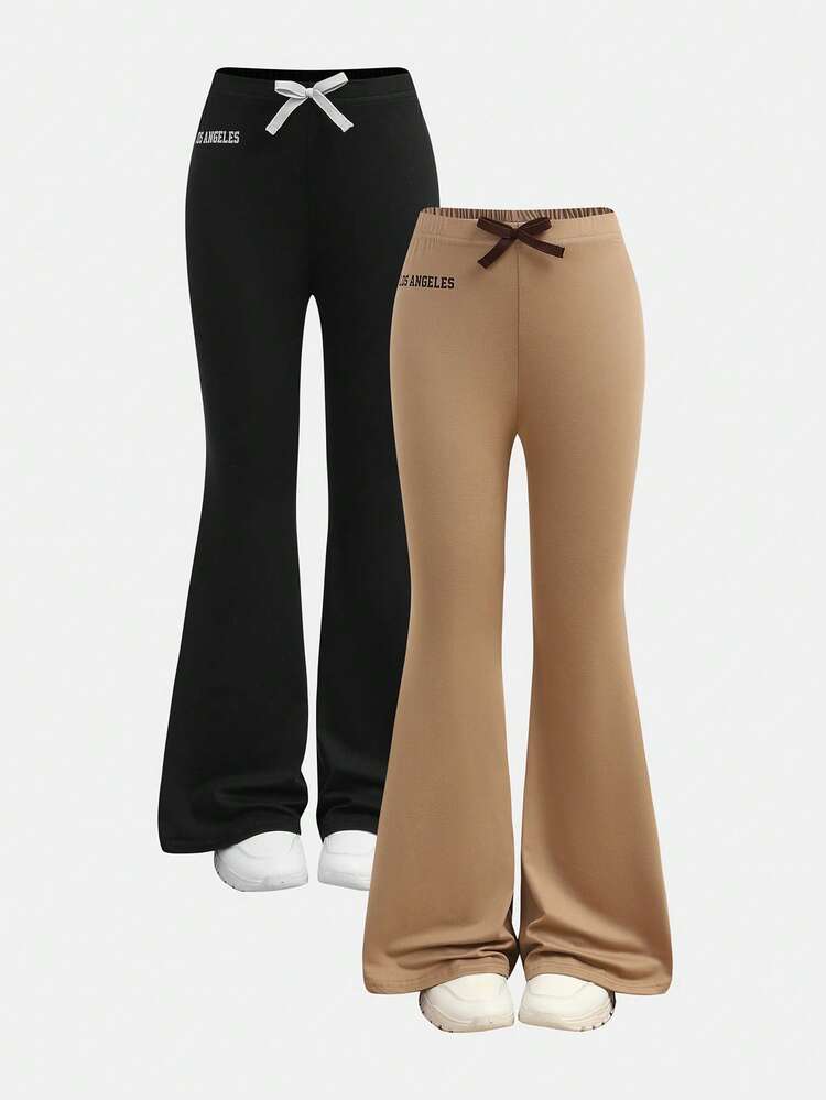 SHEIN Girlism 2件套青少年女孩休闲运动图案文字印花丝带蝴蝶结装饰修身喇叭裤套装 - 卡其色 - 查看 1