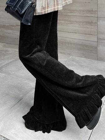 FRIFUL 여성 가을 심플 솔리드 컬러 탄성 허리 러플 헴 플레어 팬츠