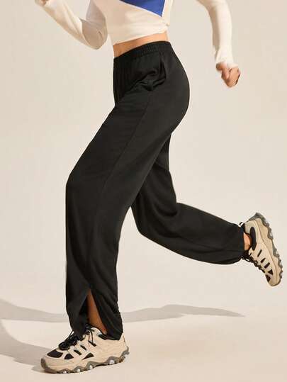 Exploreva 户外黑色裤子，带拉链裤腿开口和侧袋，运动裤和慢跑裤