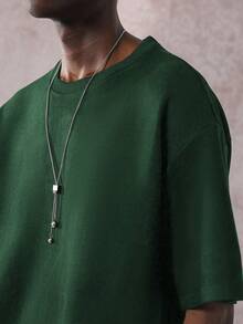 STYNVO Áo thun nam cổ tròn rộng rãi họa tiết chữ - Màu xanh lá cây đậm - Xem 6