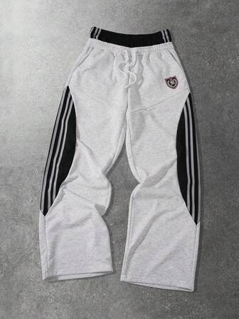 Street Life Herren Loose Fit Jogginghose mit doppellagigem Bund und kontrastfarbigen Einsätzen