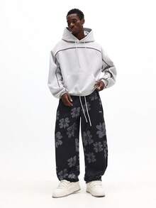 SUMWON Pantalones de chándal con estampado floral de pierna recta y cordón, con gran patrón de flor gris de Summon Studios - Multicolor - Ver 4