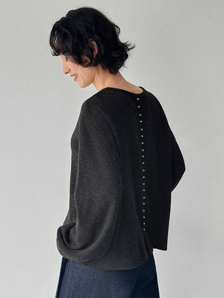 FRIFUL 女士纯色圆领落肩长袖T恤，背面饰有砖块图案，侧边开衩下摆，宽松休闲百搭，适合秋冬季穿着。 - 黑色 - 查看 1