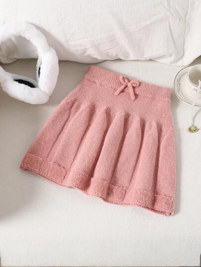 SHEIN Conjunto de suéter tejido y falda A-line para niñas, con decoración de lazo, estilo académico elegante y minimalista, cálido y cómodo para uso diario, otoño/invierno
