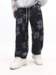 SUMWON Pantalones de chándal con estampado floral de pierna recta y cordón, con gran patrón de flor gris de Summon Studios - Multicolor - Ver 5