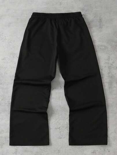 Pantalon de survêtement ample avec taille à cordon de serrage et poches, imprimé gothique pour hommes