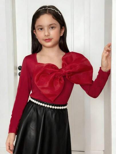 SHEIN Vestido de camiseta de manga larga con diseño de gran lazo elegante para niña preadolescente en Navidad