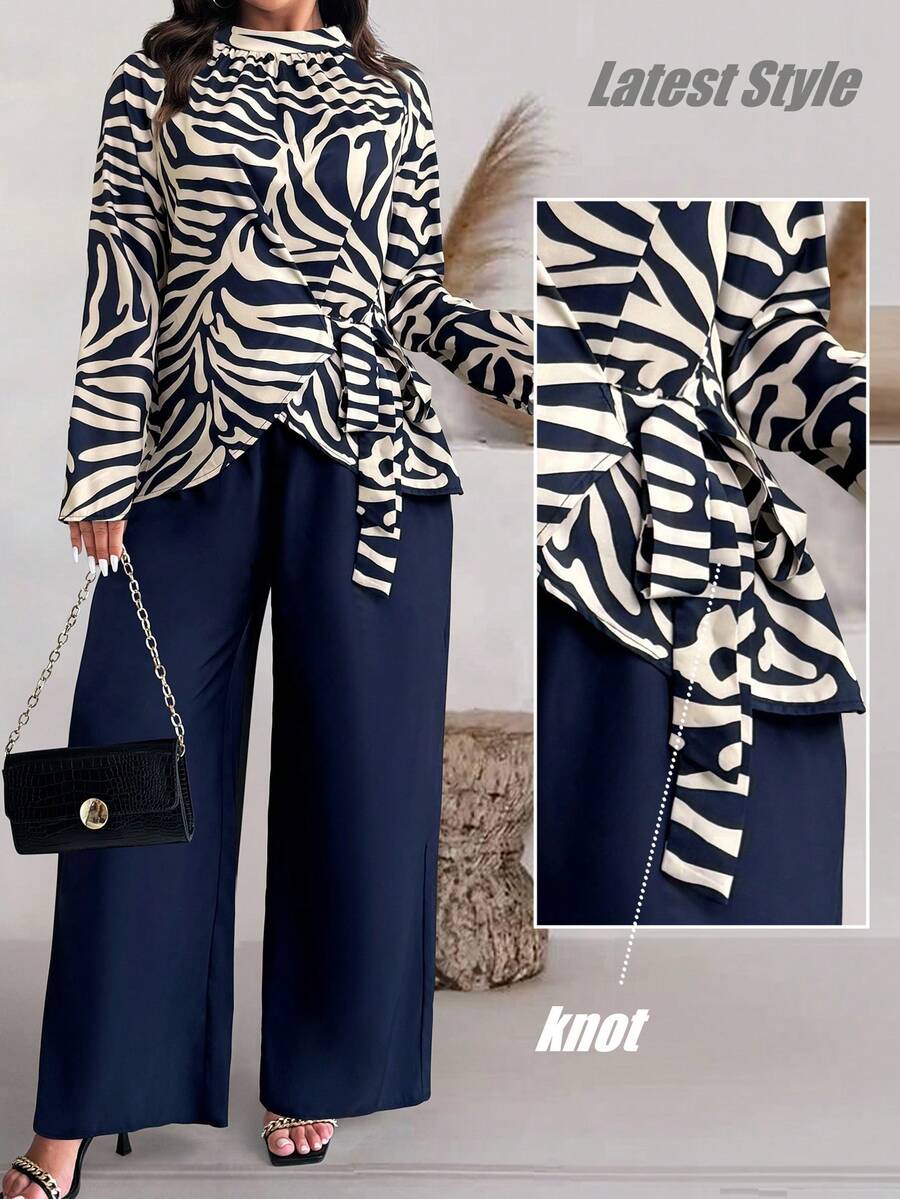 Weeklong طقم ملابس علوية مطبوعة مع ربطة أمامية وبنطال أحادي اللون مقاسات كبيرة للنساء - متعدد الألوان - مشاهدة 1