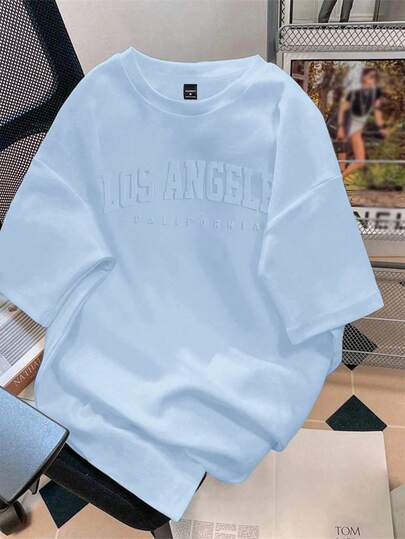 Manfinity Joysei Camiseta de cuello redondo blanca para hombre de etiqueta azul claro (Tela)