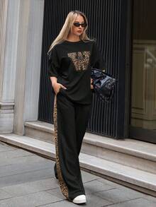 SHEIN Cottnline Plus Size Solid Color Leopard Patch Detailed Short Sleeve Drop Shoulder Top T-Shirt And Side Leopard Panel Detailed Wide Leg Sweatpants 2 Pieces Outfits Co Ords Weekend Outfit Relax Comfy Leisure - Black - View 6