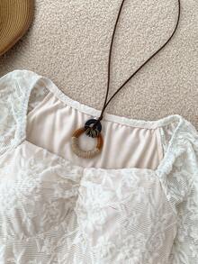 少女连衣裙 白色蕾丝提花喇叭袖短款针织连衣裙