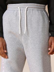 SUMWON Pantalones de chándal con cordón y ajuste relajado con estampado de texto lateral para comodidad casual - Gris - Ver 6