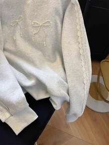 Franclia 女式休闲宽松圆领水钻蝴蝶结蕾丝拼布运动衫