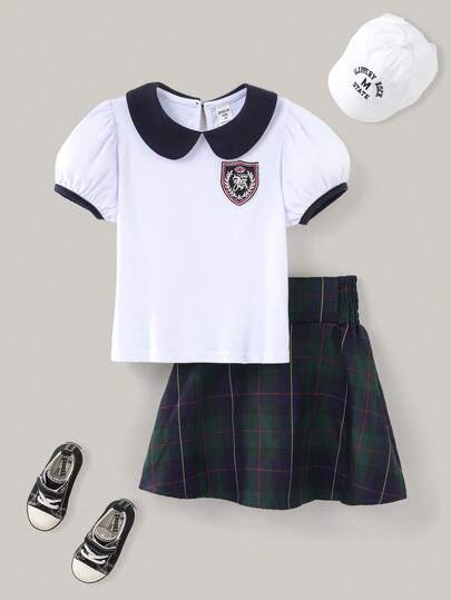 Joliand Joliand 2pcs Young Girl Elegant Urban Collegiate Badge Decor White Collar Polo Top With Puff Sleeve And Green Plaid Skirt Set, Suitable For Party, Outing, Daily, Back To School, Summer And Autumn Girls School Clothes Little Girl School Uniform Preppy School Uniform Girls School Uniform Set Plaid Skirt Set Girls Girls Preppy Outfit Toddler Girls School Clothes Back To School  School  Clothes School Supplies Backtoschool ColorfulJoy