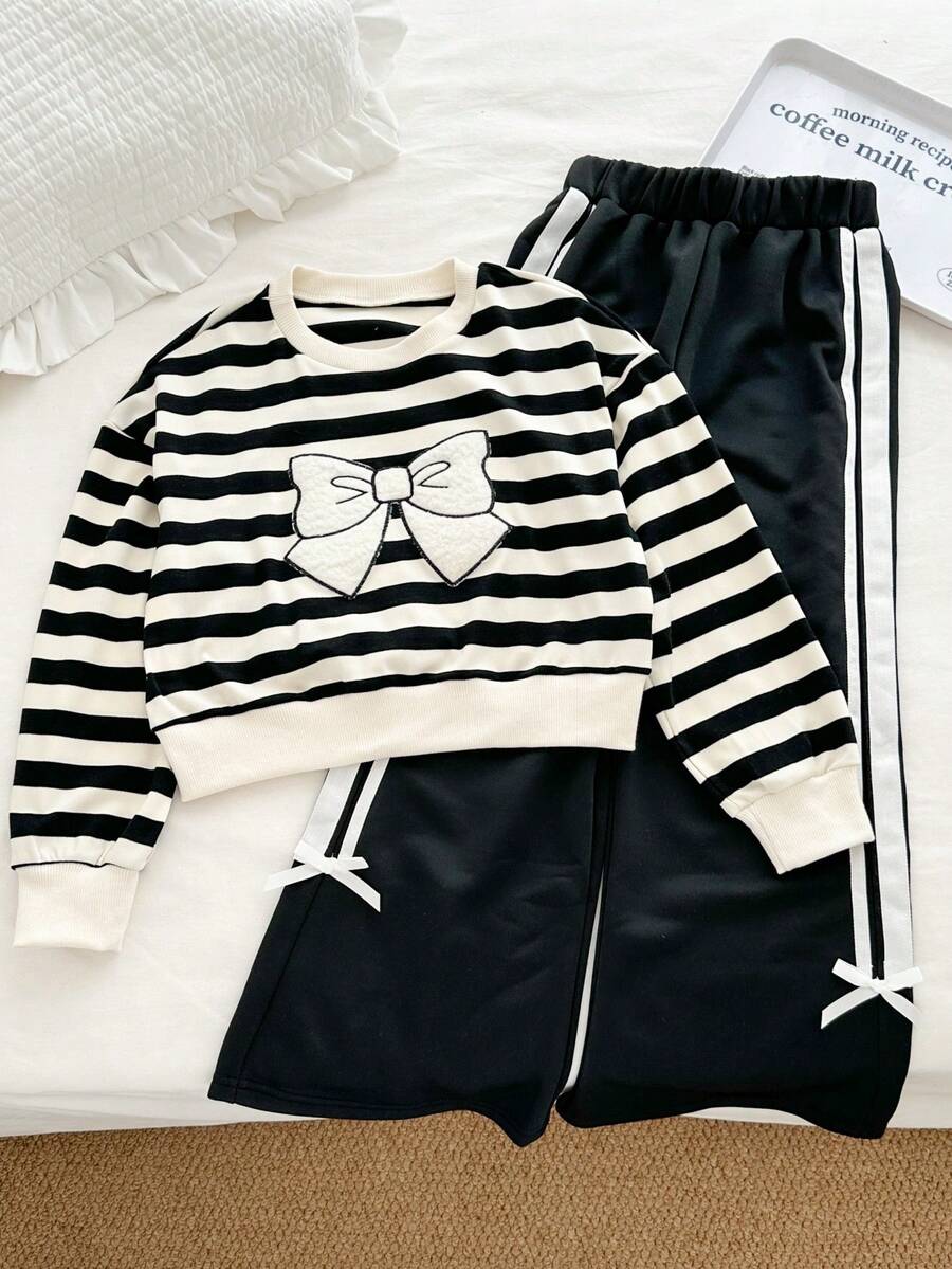 Genkimix Kids Conjunto de 2 piezas de niña preadolescente con sudadera de cuello redondo casual con rayas y decoración de lazo + pantalones rectos casuales con decoración de cinta - Negro - Ver 1