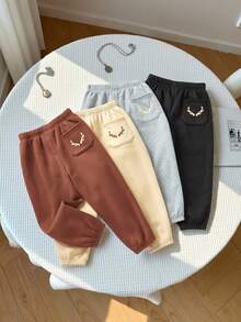 SHEIN 4pcs Young Boys' Casual Comfortable Versatile Cute Printed Thermal Lined Thick Sweatpants, School Clothes - Multicolor - View 1