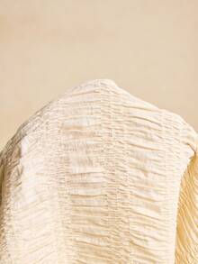 Poéselle Áo thun nữ cổ tròn tay dài xếp ly màu trơn thường ngày - Màu be - Xem 8