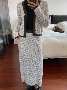 DAZY Conjunto de 2 piezas casual y elegante para mujer, compuesto por un cárdigan de manga larga de cuello en V holgado con contraste de blanco y negro, y una falda larga recta gruesa para otoño/invierno