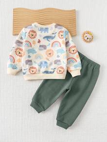 Cozy Pixies 2 Stücke Set für Baby Jungen: Weiches Strick-Sweatshirt mit Rundhalsausschnitt und langen Ärmeln, bedruckt mit Tiermotiven, und passende Hose mit elastischem Bund.