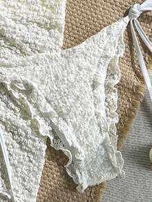 Swim Mod 3件套纯色花卉纹理面料珍珠贝壳装饰荷叶边挂脖三角比基尼上衣、侧系带泳裤和迷你裙性感泳衣套装，春夏沙滩裙套装钩针编织泳衣沙滩两件套钩针编织比基尼套装蕾丝两件套