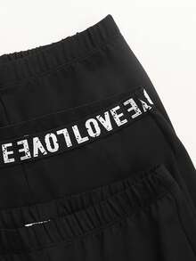 SHEIN Quần legging ống loe cạp chun họa tiết chữ Tween dành cho bé gái - màu đen - Xem 4