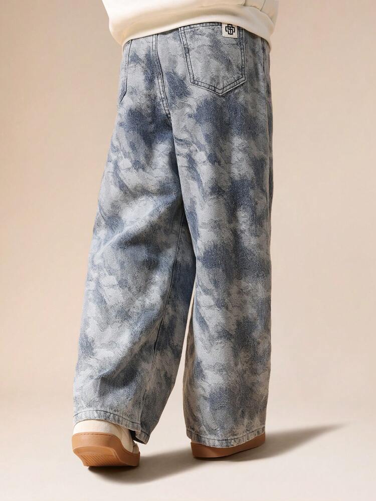 Vaqueros de mezclilla con efecto tie-dye y pierna ancha