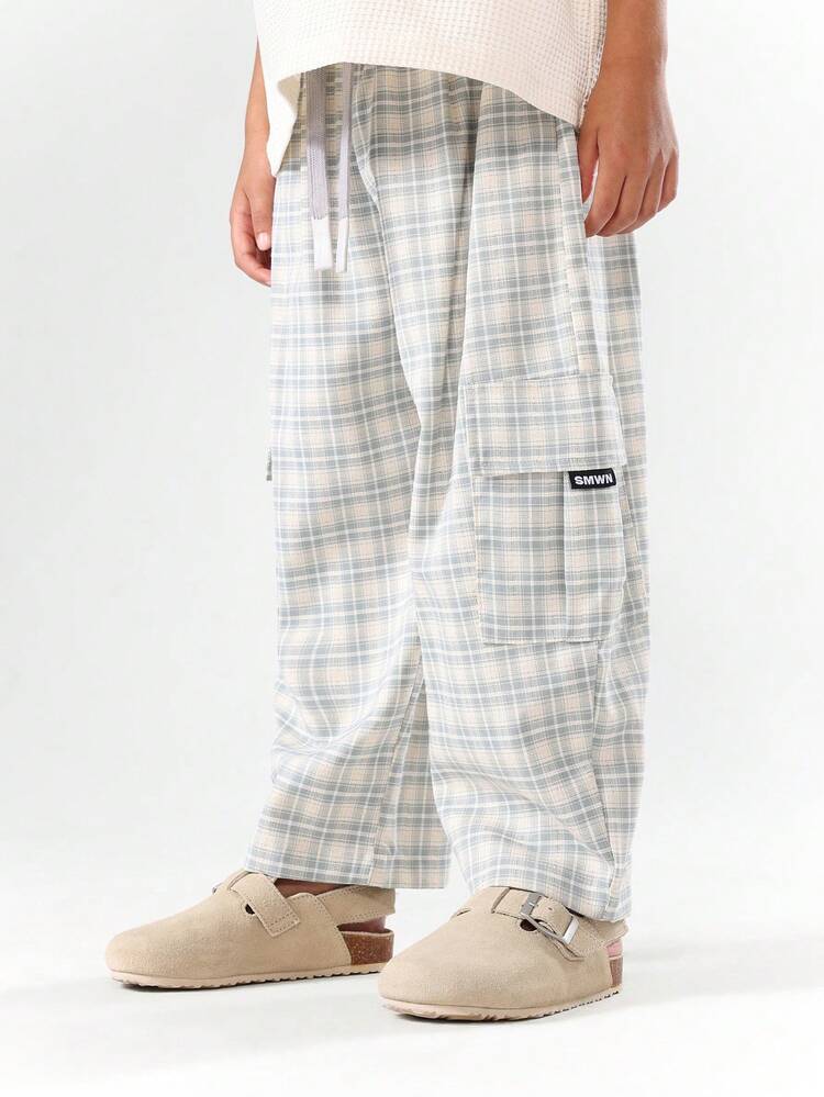 Spodnie z szerokimi nogawkami w kratkę