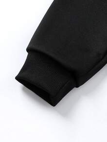 Sparklyn 这款少女秋冬返校休闲卫衣，正面印有图案，搭配不对称无袖背心罩衫和不对称下摆的短款长袖套头衫，适合少女日常休闲、上学、度假和圣诞节穿着。 - 黑色 - 查看 6