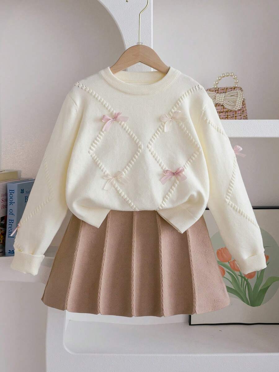 SHEIN Genkimix Kids Tween Girl 2 Pieces Knit Set, Cute 3D Bow Sweater With Pleated Skirt, Adorable & Elegant, Winter Skirt Two Piece Set For Kids Tween Matching Set Knit Girl Clothes Autumn And Winter Clothes Girl Knit Set Girls Sweater Skirt Set