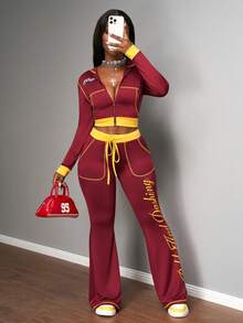 Slaydiva Bộ đồ hai mảnh nữ mùa thu đông 2025 mới, áo trùm đầu dài tay hở trước ngắn màu đỏ rượu vang và vàng, dáng ôm vừa vặn, quần ống loe cạp cao, thích hợp cho các bữa tiệc, trang phục rave, trang phục Halloween, đi chơi đêm, trang phục câu lạc bộ gợi cảm cho phụ nữ, trang phục ăn trưa cho phụ nữ, thời trang đường phố, đi chơi hàng ngày, trở lại trường, thể thao-A - Màu Đỏ Sâu - Xem 5