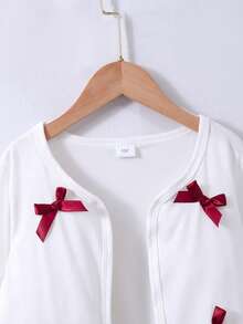 SHEIN ChillGRL Tween Girls Retro Elegant Black Bow Cardigan And White Bow Strap Puff Strap Dress Set