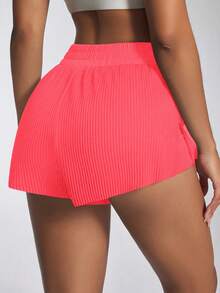 Core Rhythm Quần short thể thao họa tiết chữ xếp ly màu hồng neon đa năng thoải mái - Hồng - Xem 2