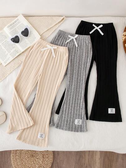 3 piezas Pantalones acampanados para niñas pequeñas, para primavera/otoño, de tela rizada y con textura, de cintura regular, con decoración de lazo, casuales, deportivos, versátiles, en color albaricoque/gris/negro