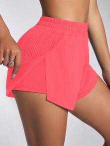 Core Rhythm Quần short thể thao họa tiết chữ xếp ly màu hồng neon đa năng thoải mái - Hồng - Xem 6