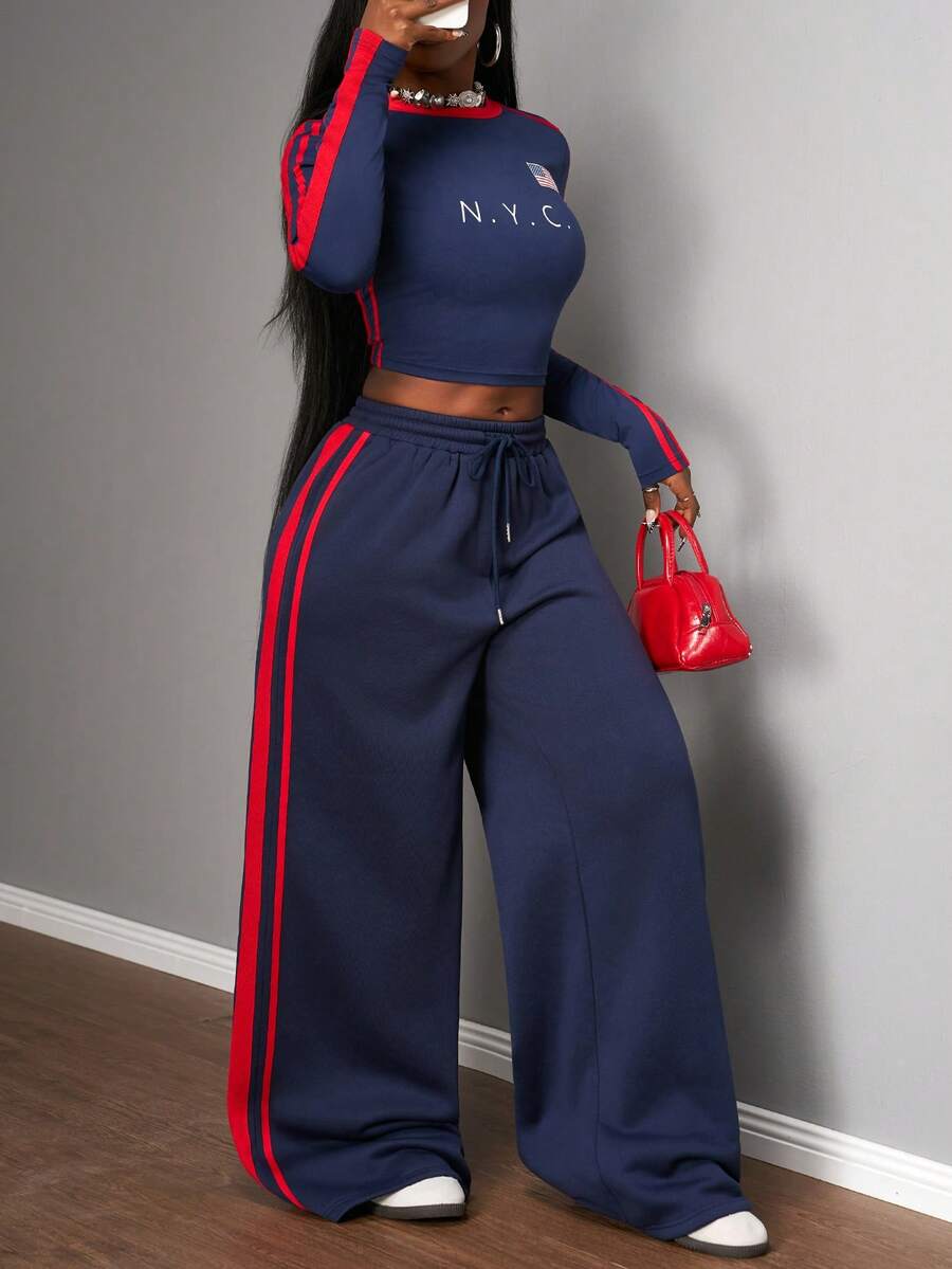 Slaydiva 2025 Automne et Hiver Nouveau Ensemble Deux Pièces Casual Slim Fit Bleu Marine et Rouge Ruban Motif Lettre Col Rond Manches Longues T-Shirt + Pantalon Fuselé à Taille Haute et Jambes Larges Plissé. Convient pour la rentrée scolaire, les tenues de rave, Halloween, Noël, sortie, tenue d'anniversaire, brunch pour femmes, soirée, tenues quotidiennes, tenues de club sexy pour femmes, rendez-vous