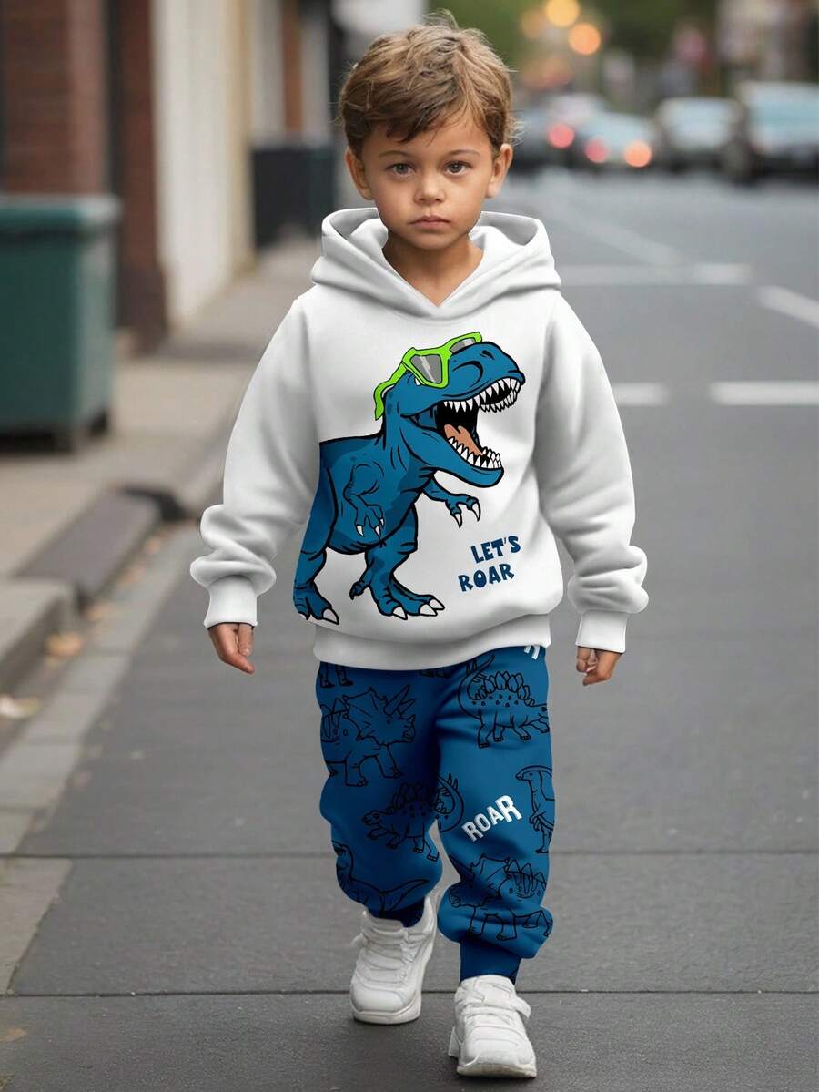 SHEIN Young Boys Casual Loose Comfortable Cartoon Animal Cute Dinosaur Sports Style Graffiti Loose Fit Long Sleeve Hoodie 2 Pieces Set, Suitable For Autumn/Winter Boys Dinosaur Clothes Boys Hoodie And Sweat Pants Kids Hoodies Boys Dinosaur Hoodie And Sweatpants Set Boys Dinosaur Sweatshirt Fall - Multicolor - View 1
