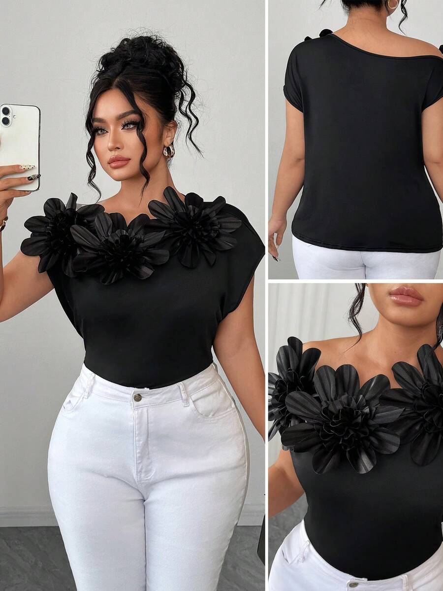 Elenzga Elegante Bluse mit 3D Blumen Dekor für Damen in Große Größen, asymmetrischer Kragen, Bluse mit schräger Schulter und 3D Blumen Dekor, asymmetrischer Kragen, elegante Einfarbige Bluse - Schwarz - Übersicht 1