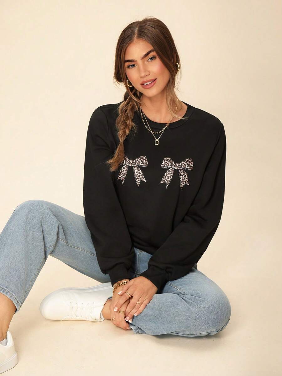 Coeurva Casual Minimalist Leopard Print Bow Graphic Black Crew Neck Loose Fit Lightweight Women Pullover Sweatshirt In Fall/Winter - Black - View 1