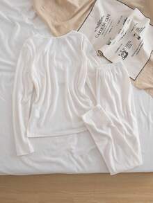 SHEIN Set de parte superior e inferior casual y versátil de 2 piezas con cuello redondo de manga larga, tejido, ajustado, con encaje y lazo negro decorativo, para adolescentes, piel amigable - Blanco - Ver 2