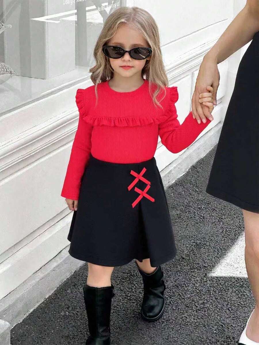 SHEIN Elladie kids Young Girls Cute Black Ribbed Long Sleeve Top Paired With Bow Decor Split Hem Skirt, Autumn/Winter T-Shirt Set
