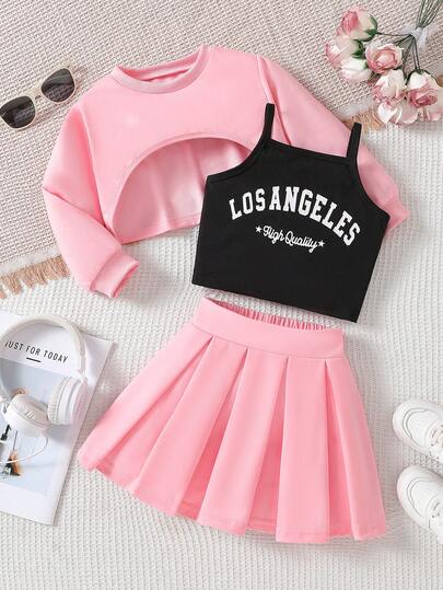 SHEIN Explorewe 3pcs Young Girl Outfit: Apricot Sweatshirt Provides Warm & Soft Feeling, Comfortable & Versatile; Black Vest With Simple But Fashionable "LOS ANGELES" Print; Woven Skirt Shows Sweet & Cute Style. Coordinating Colors, Can Be Worn Separately Or Matched For Different Stylish Looks, Suitable For Spring, Autumn & Winter